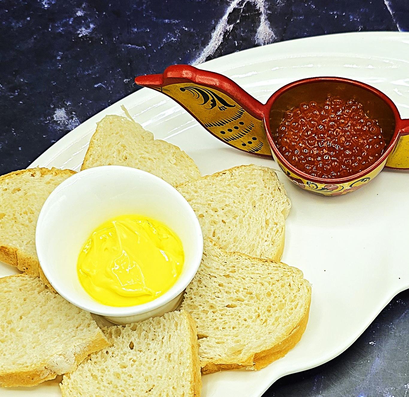 Red caviar with bread and whipped butter