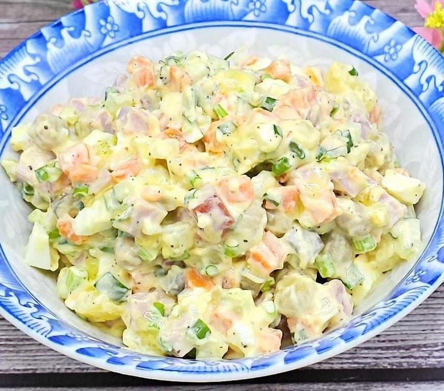 Olivier salad with homemade mayonnaise and smoked ham