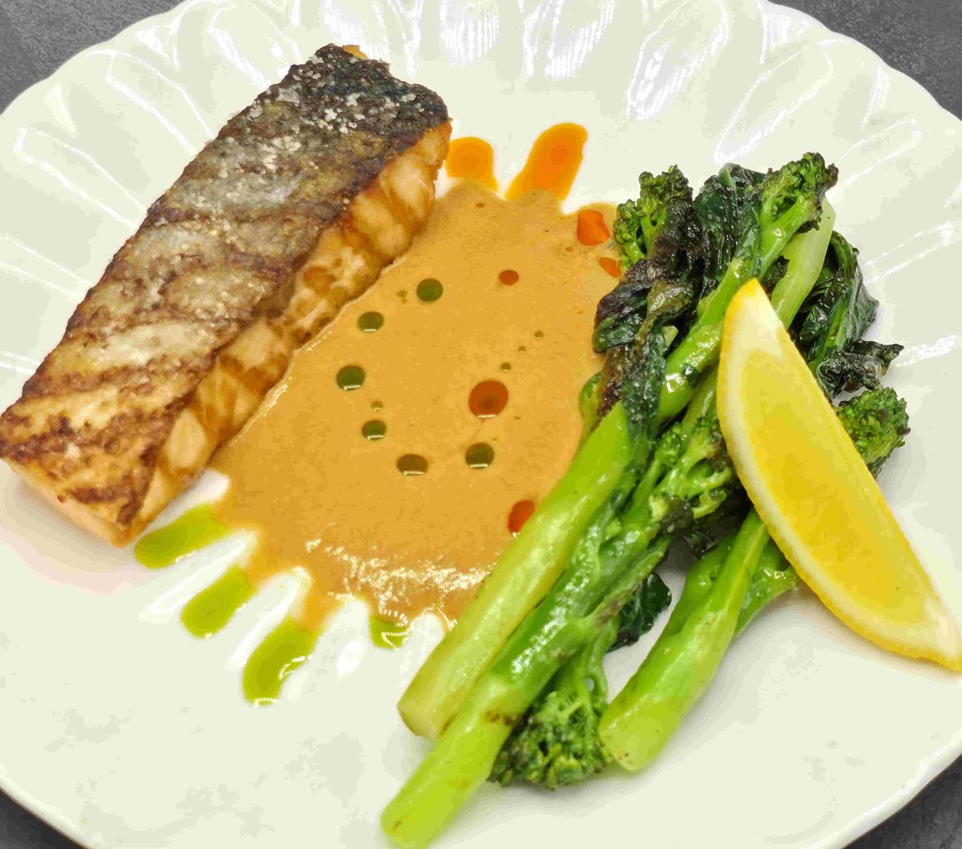 Salmon with mini kale and bisque sauce