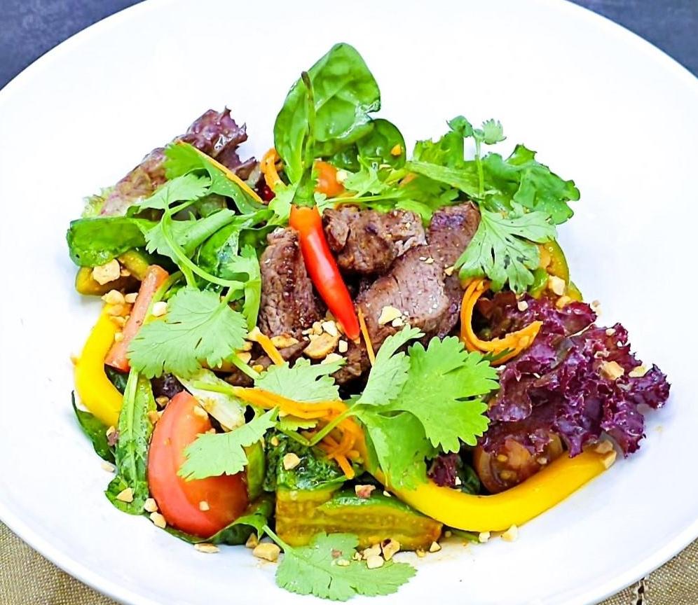 Veal, cucumber, tomato and carrot salad in Thai style