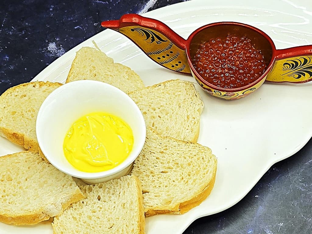 Red caviar with bread and whipped butter