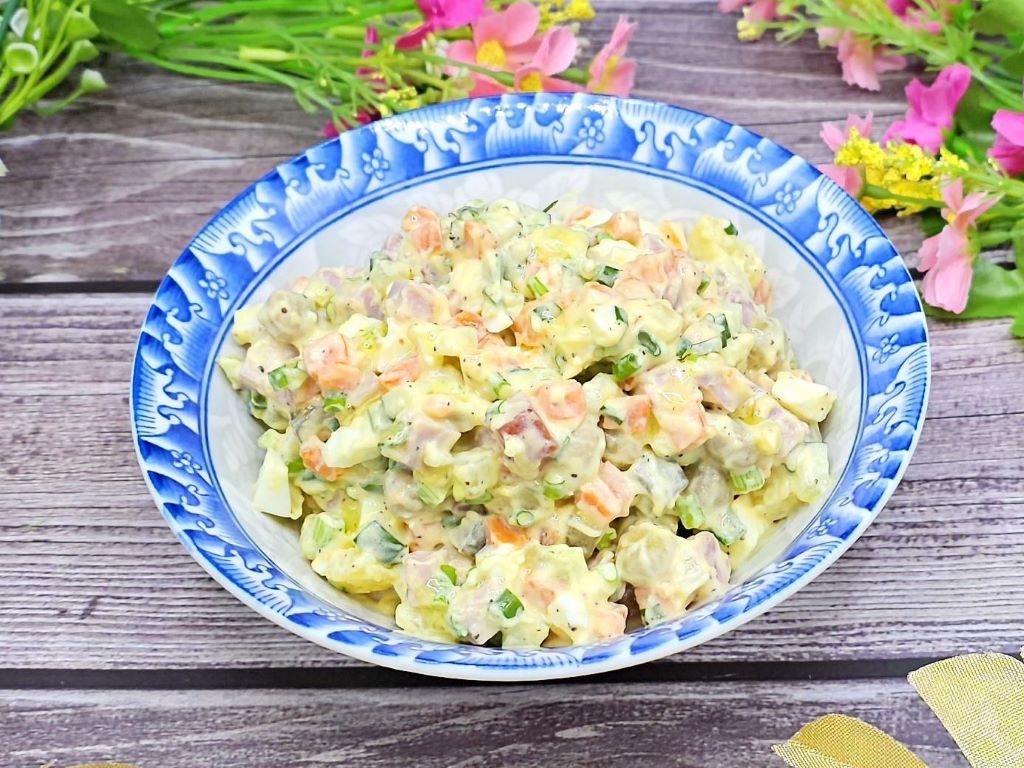 Olivier salad with homemade mayonnaise and smoked ham