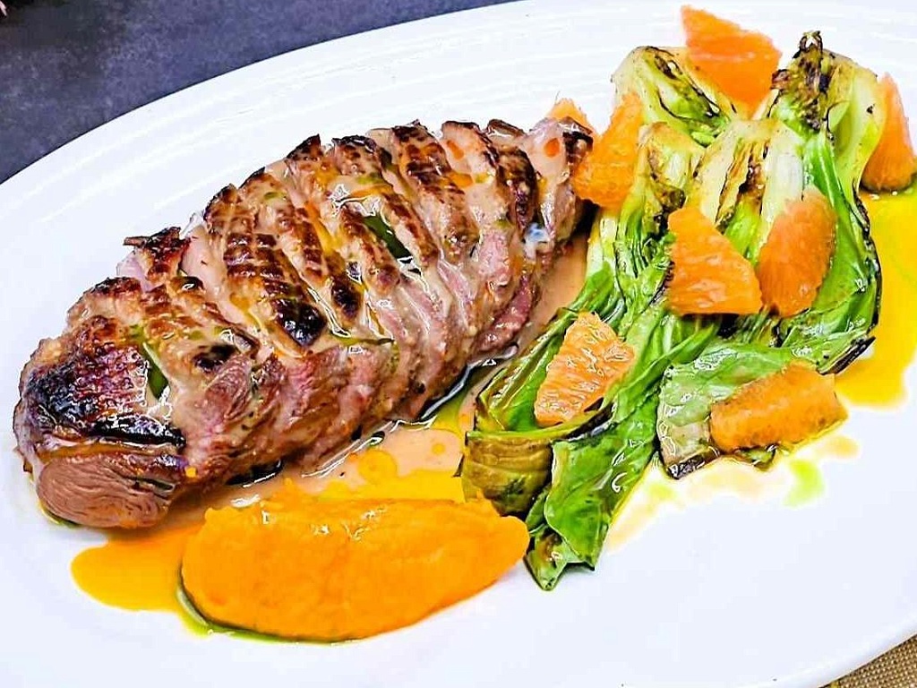 Farmed duck fillet with smoked carrot and bok choy puree