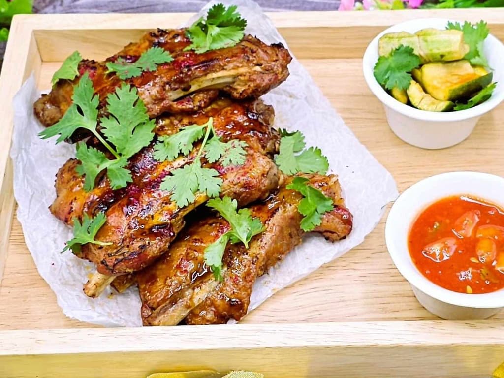 Sous-vide pork ribs in asian spices with smashed cucumbers 