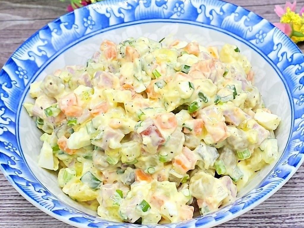 Olivier salad with homemade mayonnaise and smoked ham